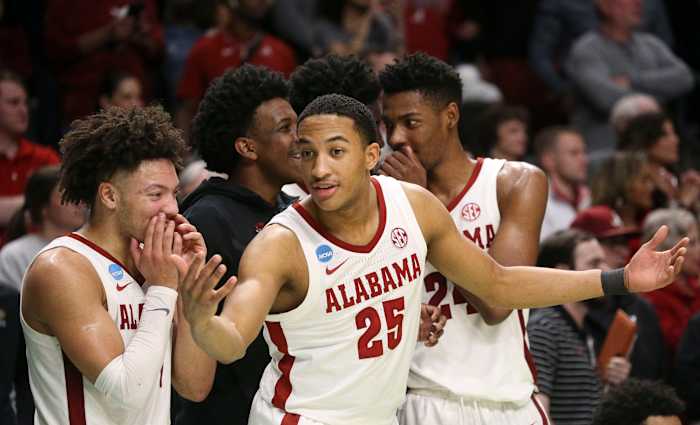 Mar 18, 2023; Birmingham, AL, USA; Alabama guard Mark Sears (1) and Alabama guard Nimari Burnett (25) enjoy the final minutes of the Crimson Tide s win over Maryland at Legacy Arena during the second round of the NCAA Tournament. Alabama advanced to the Sweet Sixteen with a 73-51 win over Maryland.